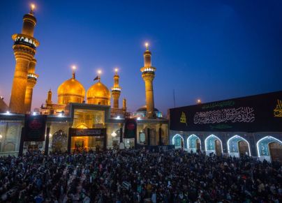 Iraqi Shiite Muslim pilgrims gather to pray at the shrine of the 8th-century Imam Musa al-Kadhim in the Kadhimiya district, north of Baghdad, on February 15, 2023. - Pilgrims from various Iraqi provinces undertake a march on foot to reach the shrine in the capital to commemorate the eighth century death of Imam Musa, who is believed to have been poisoned by agents of the then ruler Harun al-Rashid. (Photo by Murtadha RIDHA / AFP) (Photo by MURTADHA RIDHA/AFP via Getty Images)