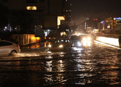 ERBIL, IRAQ - NOVEMBER 19: Vehicles have difficulty moving forward due to puddles formed on the streets after the heavy rain in Erbil, Iraq on November 19, 2023. (Photo by Ahsan Mohammed Ahmed Ahmed/Anadolu via Getty Images)