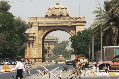 A picture taken on June 3, 2019 shows the Victory Arch known as the Swords of Qadisiyah, to mark Iraq's war against Iran, in Baghdad's high-security Green Zone. - The Green Zone, home to the Iraqi parliament and US embassy, fully reopened to traffic around the clock today, the government said. It has been heavily fortified since the US-led invasion that overthrew dictator Saddam Hussein in 2003, with nearly all Iraqis denied access to its 10 square kilometres. (Photo by AHMAD AL-RUBAYE / AFP) (Photo credit 