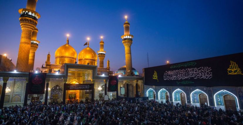 Iraqi Shiite Muslim pilgrims gather to pray at the shrine of the 8th-century Imam Musa al-Kadhim in the Kadhimiya district, north of Baghdad, on February 15, 2023. - Pilgrims from various Iraqi provinces undertake a march on foot to reach the shrine in the capital to commemorate the eighth century death of Imam Musa, who is believed to have been poisoned by agents of the then ruler Harun al-Rashid. (Photo by Murtadha RIDHA / AFP) (Photo by MURTADHA RIDHA/AFP via Getty Images)