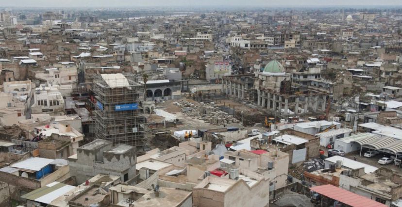 An aerial picture taken on February 17, 2024, shows a view of old Mosul and ongoing reconstruction works on the 12th century Great Mosque of al-Nuri whose "al-Hadba" leaning minaret was destroyed by Islamic State (IS) group fighters. (Photo by Zaid AL-OBEIDI / AFP) (Photo by ZAID AL-OBEIDI/AFP via Getty Images)
